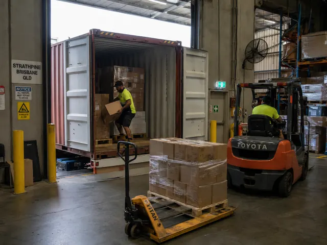 Generated warehouse scene with an open shipping container, forklift and pallet jack